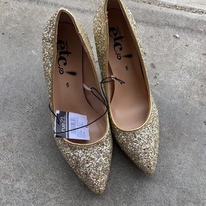 Women’s gold glitter high heel